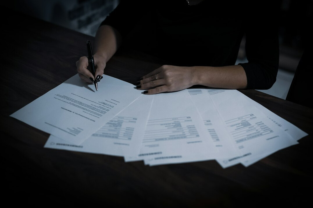 woman reviewing budget documents