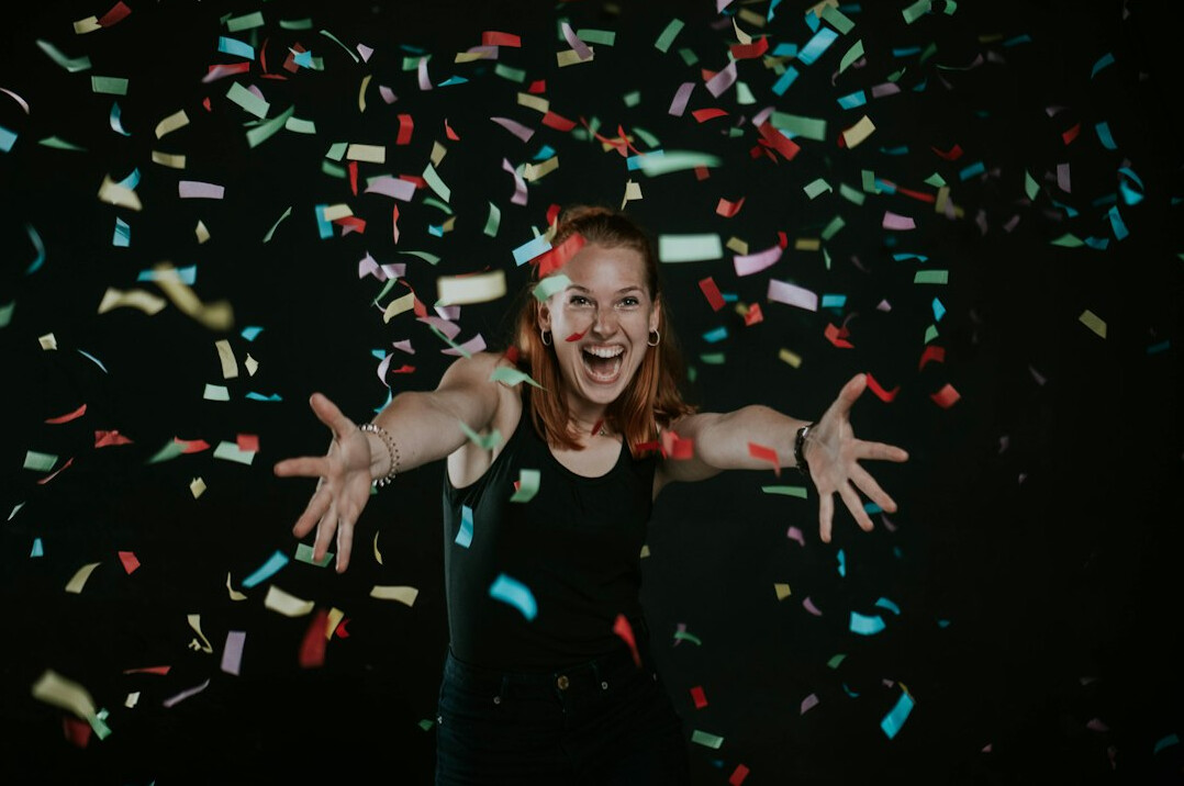person celebrating debt free