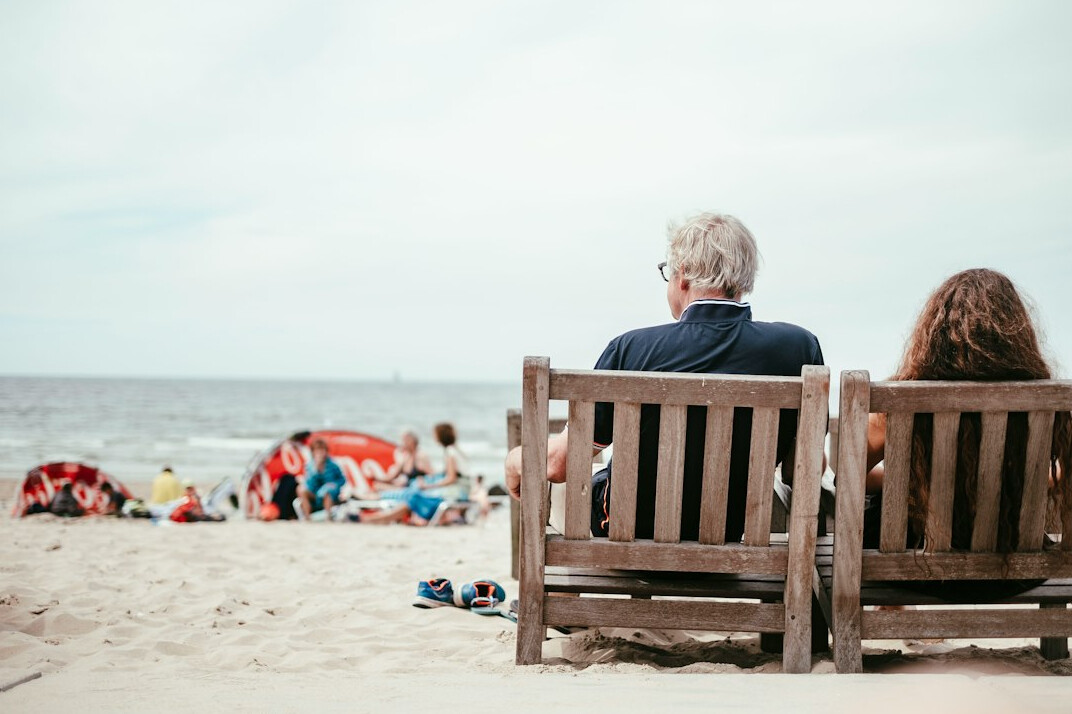 retired couple on beach