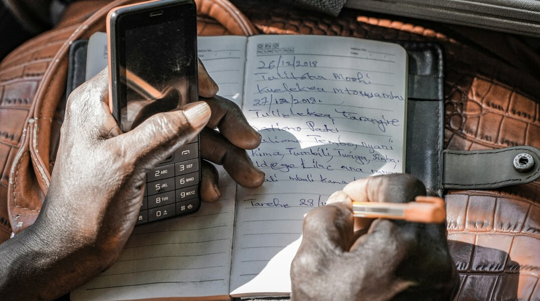 person using financial calculator